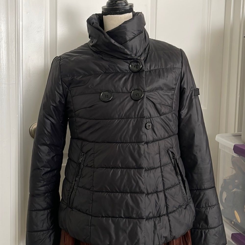 Adorable Sundance puffer coat with fun bell sleeve.